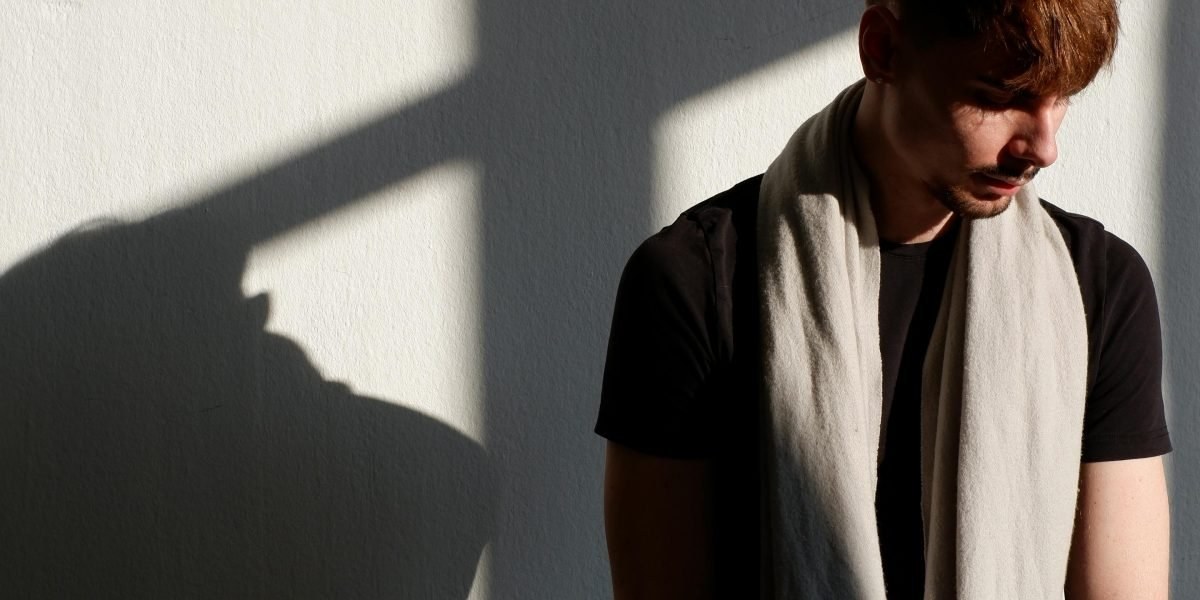 Person in a calm, reflective pose representing clarity about anxiety