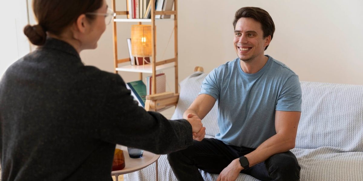 A person engaging in a therapeutic conversation, taking a step towards mental well-being.