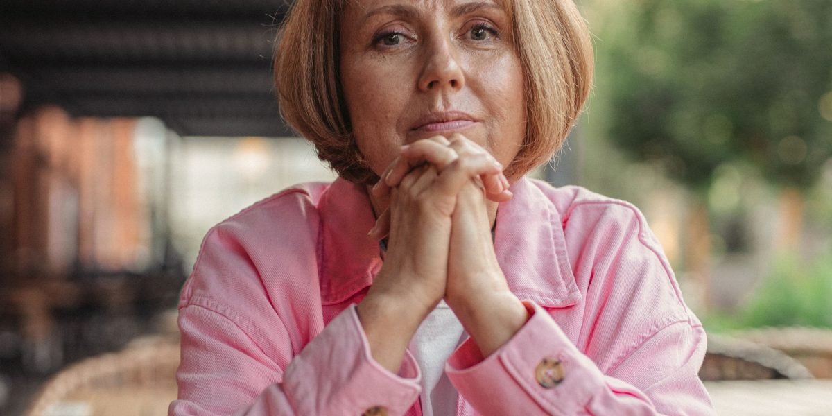 Someone in a thoughtful moment, considering how past experiences shaped their emotional responses.