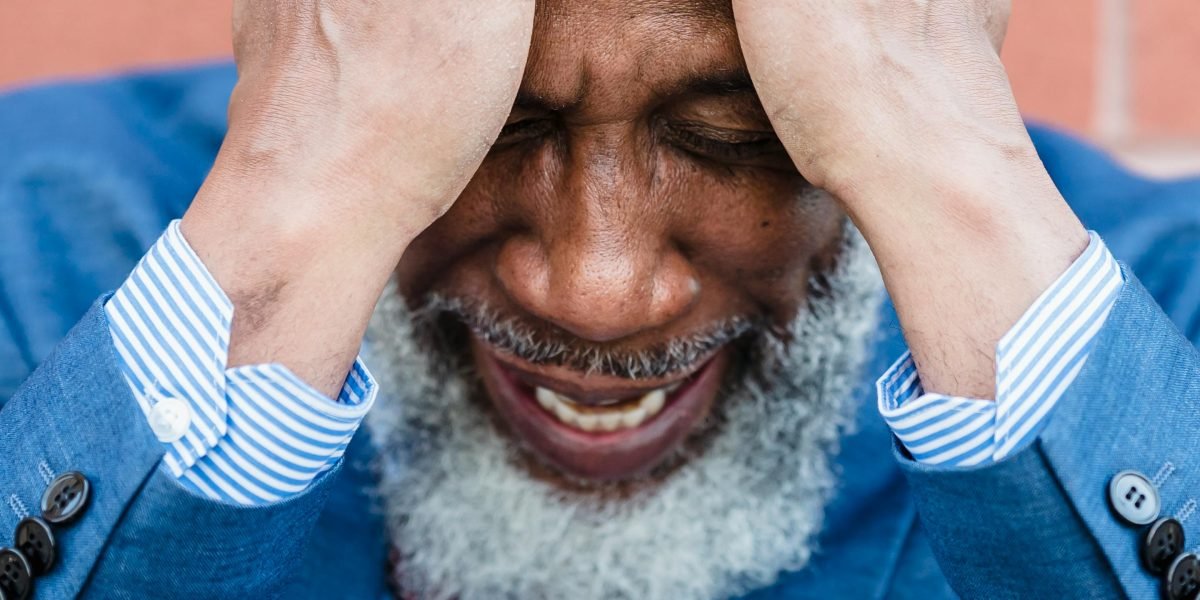 A person looking thoughtful and slightly overwhelmed, reflecting common feelings of worry or stress.