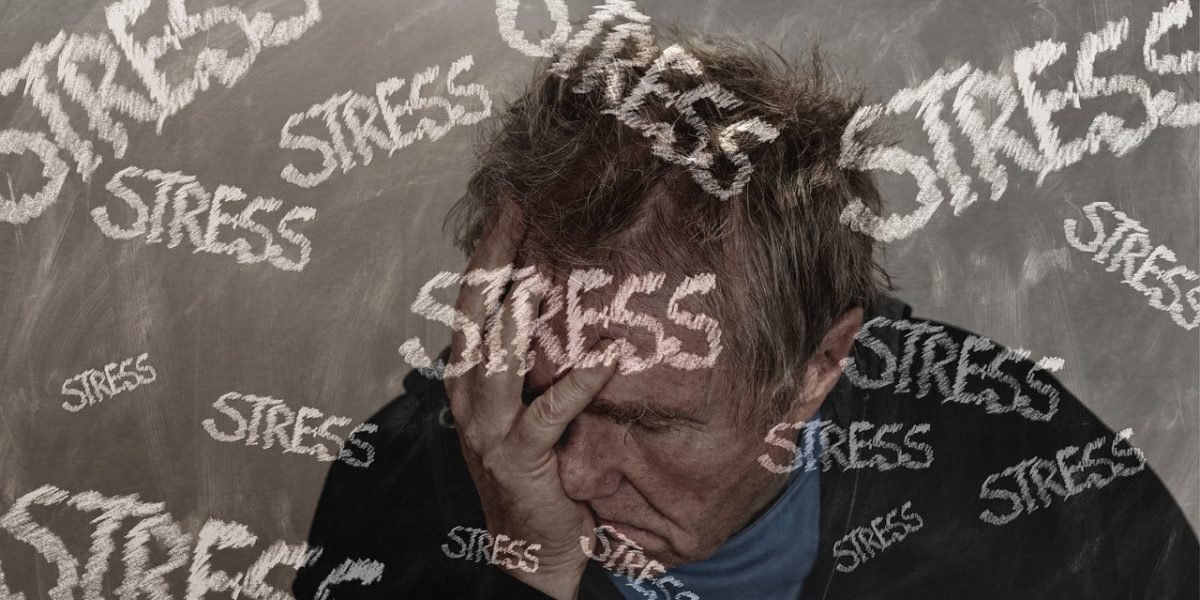 A person feeling the weight of constant pressure and potential burnout.