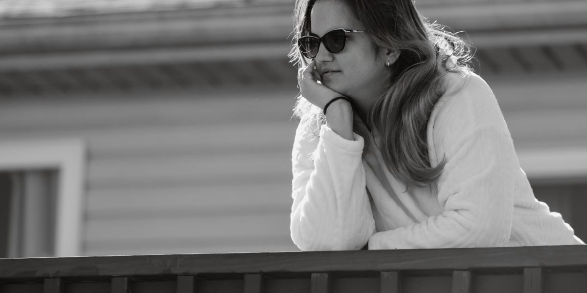 A person deep in thought, perhaps considering complex information or a personal situation.