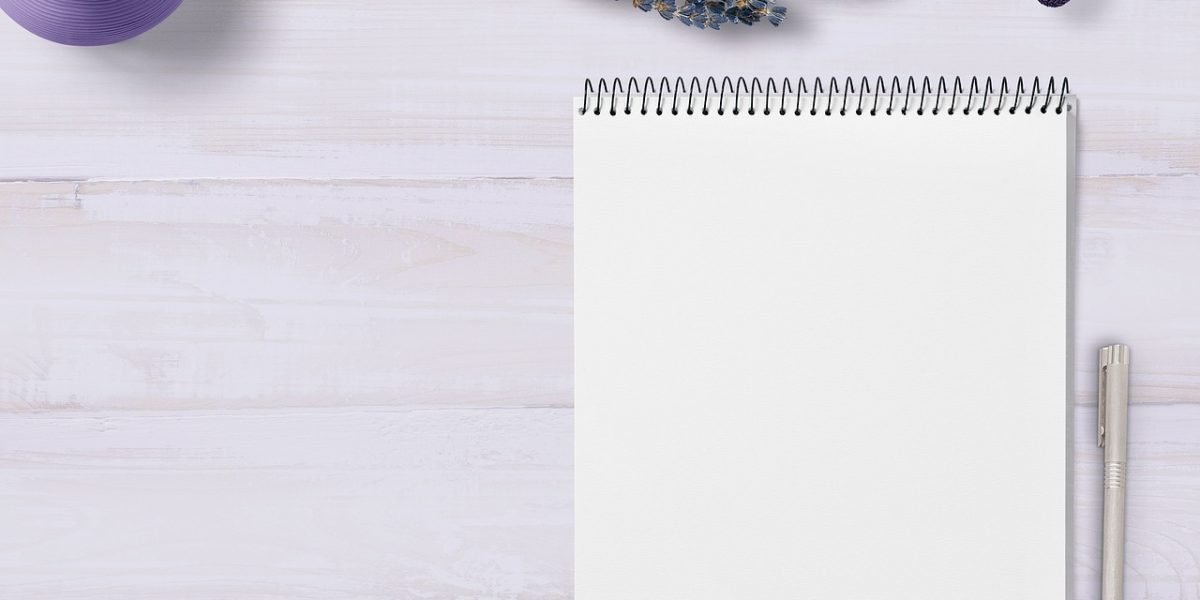 A person writing notes to clearly articulate their feelings, aiding in communication about anxiety.